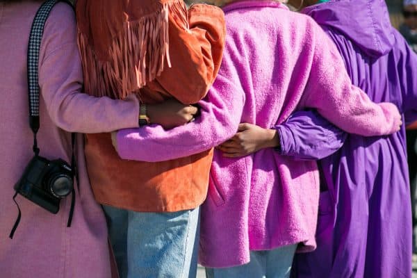 female friends, women wearing jackets, pink, purple, orange, fringe, women, friendship, crowdfunding women, women crowdfunding